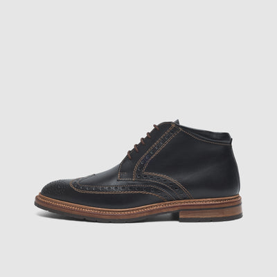 Men's boots with perforated pattern