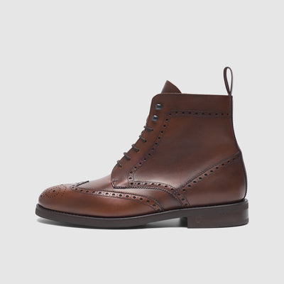 Men's boots with perforated pattern